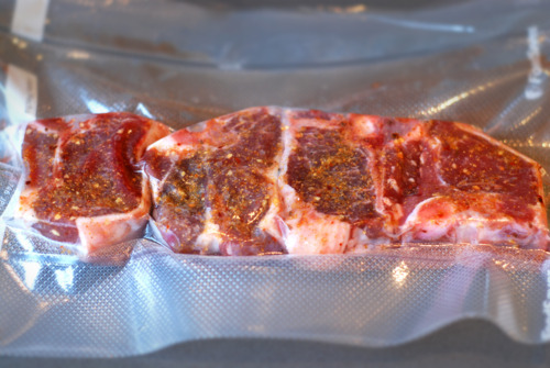 Vacuum sealed goat loin chops that have been seasoned with dry rub.