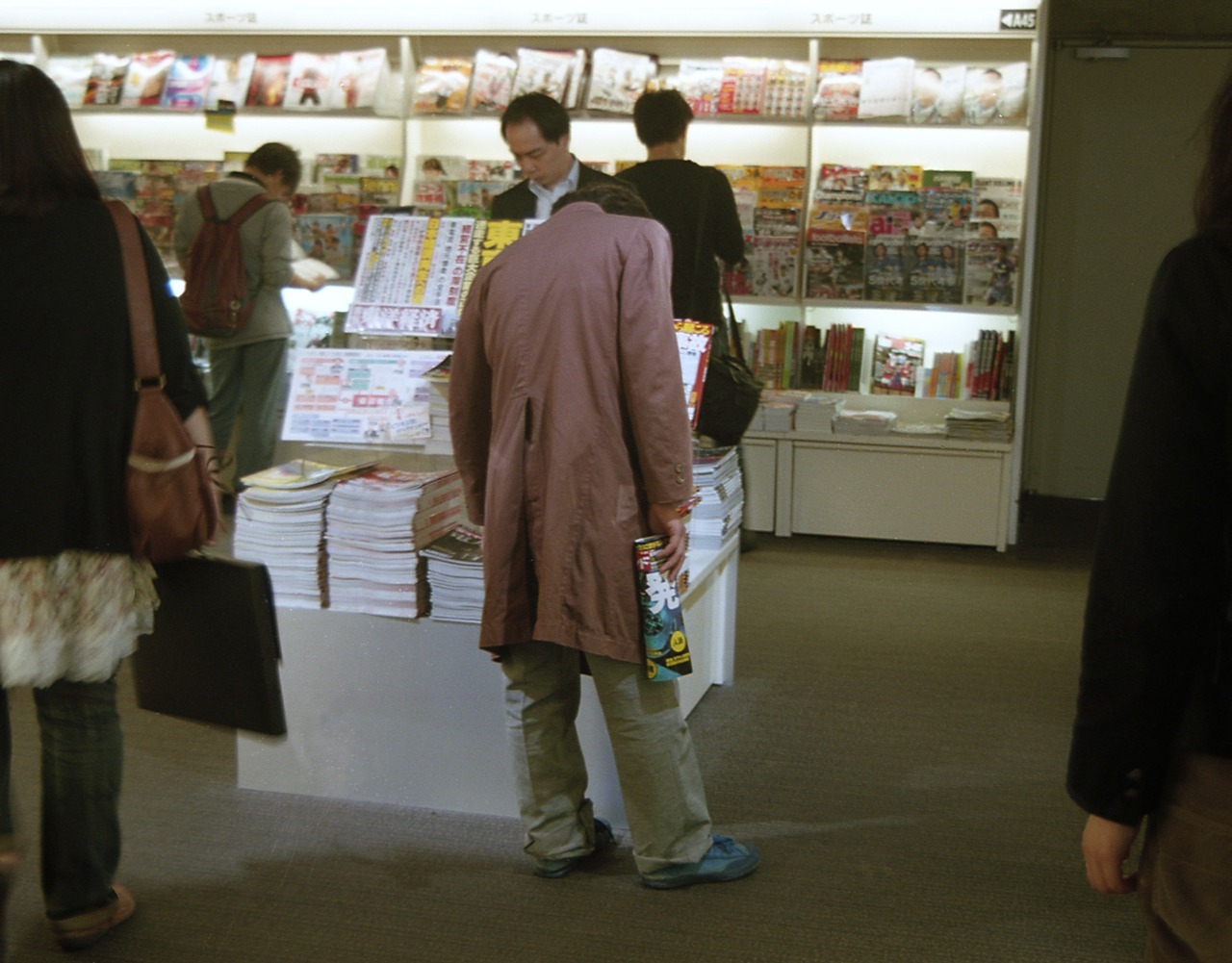 The artist is visiting a bookstore in Tokyo.
