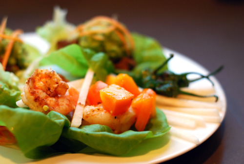 Surf and turf lettuce tacos on a plate.