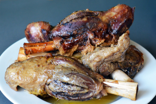 A plate piled high with slow cooker curried goat shanks.