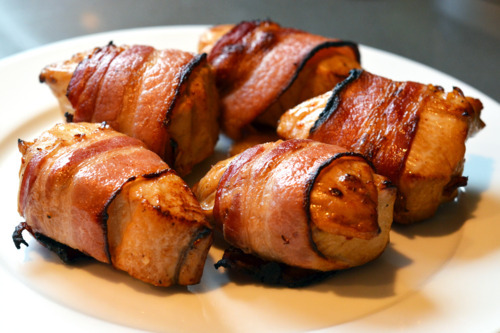 A plate of broiled bacon-wrapped tuna.