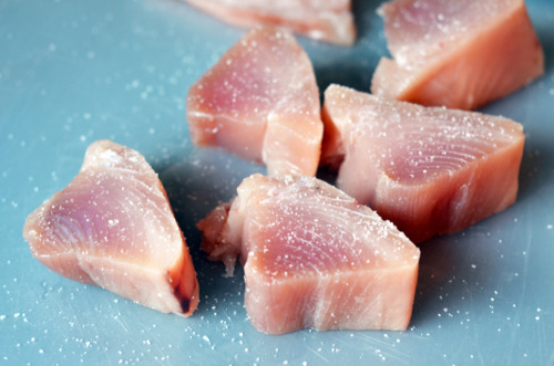 Albacore tuna steaks seasoned with salt and black pepper.