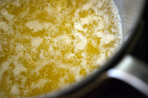 Melted butter in a saucepan.