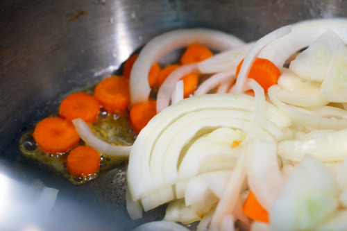 Sautéing carrots and onions in an Instant Pot for Instant Pot braised kale and carrots.