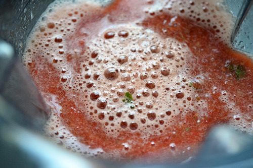 Vegetables for watermelon and tomato gazpacho blended in a blender.