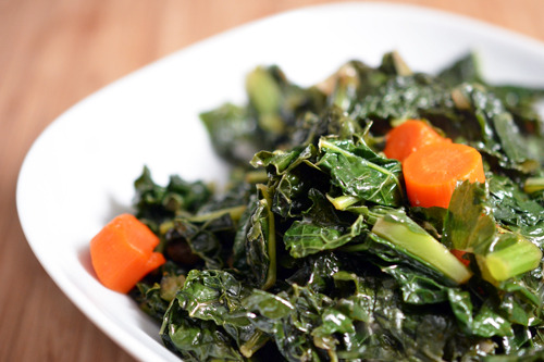 A bowl of Instant Pot braised kale and carrots.